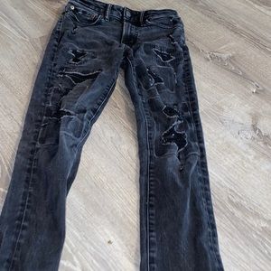 Black American eagle (young money) ripped jeans